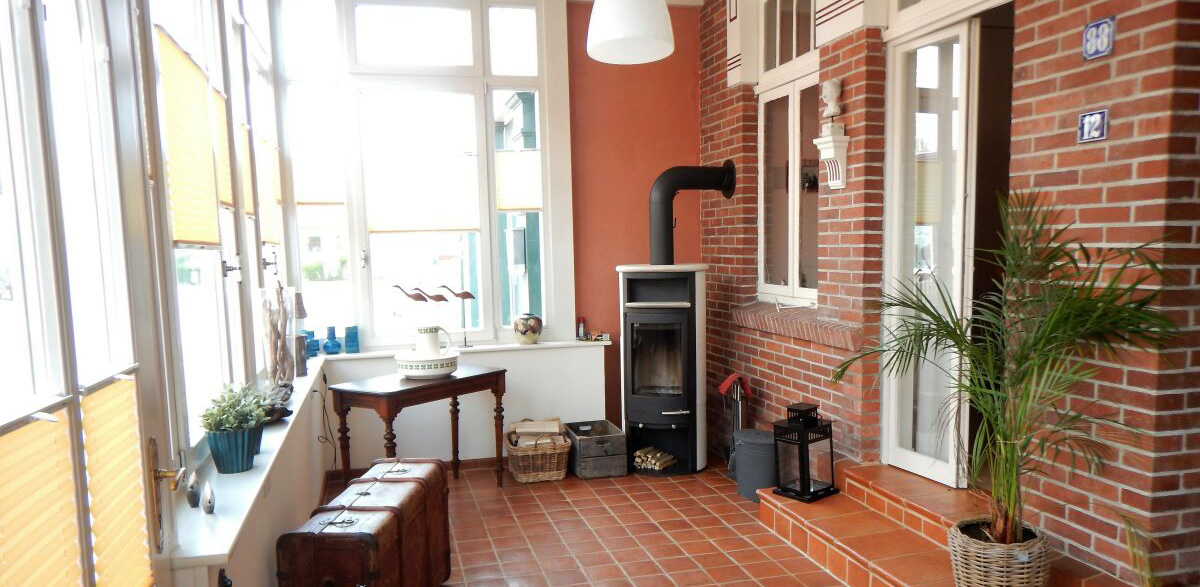 Veranda mit Kamin